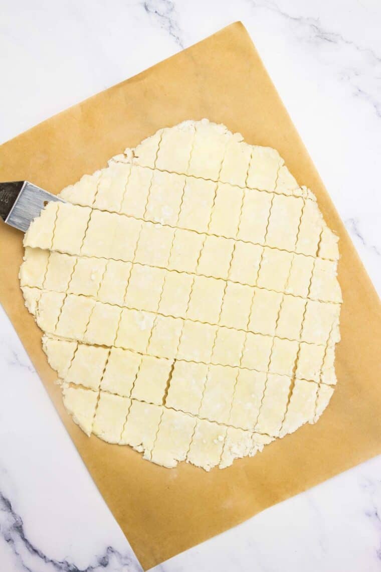 A circle of pie dough is cut into pieces.