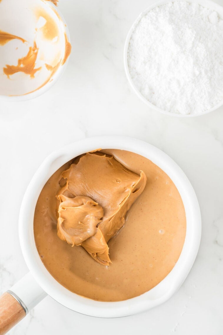 Peanut butter is mixed into the condensed milk mixture.