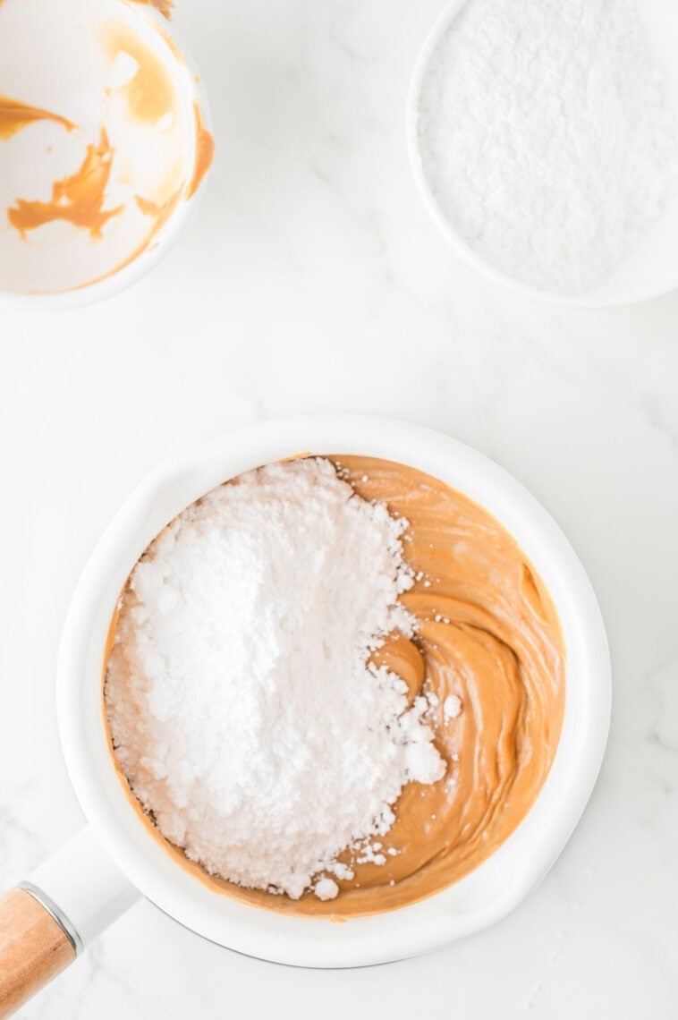 Powdered sugar is added to the fudge mixture.