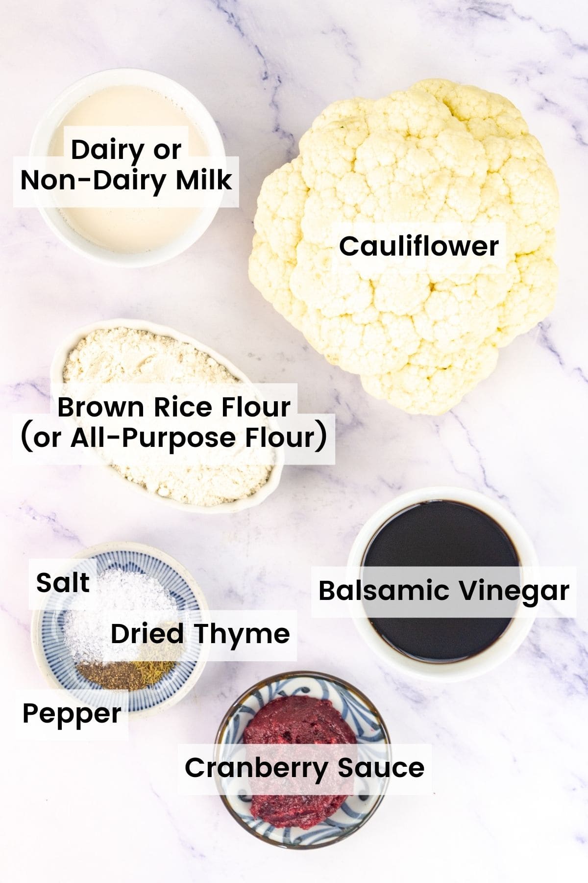Cauliflower bites ingredients portioned out on a countertop with text labels.