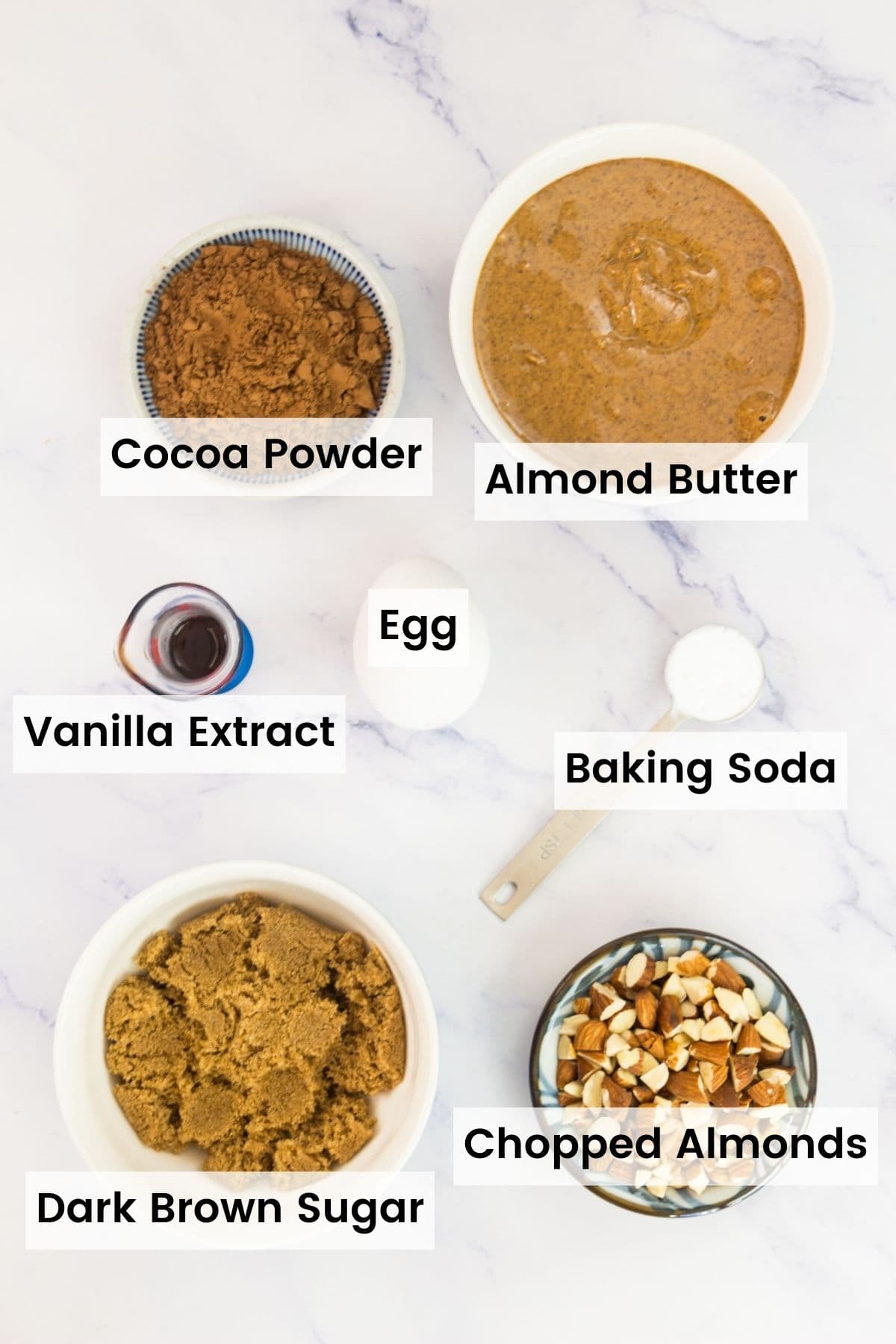 Ingredients for flourless chocolate almond cookies including vanilla and egg are text-labeled.