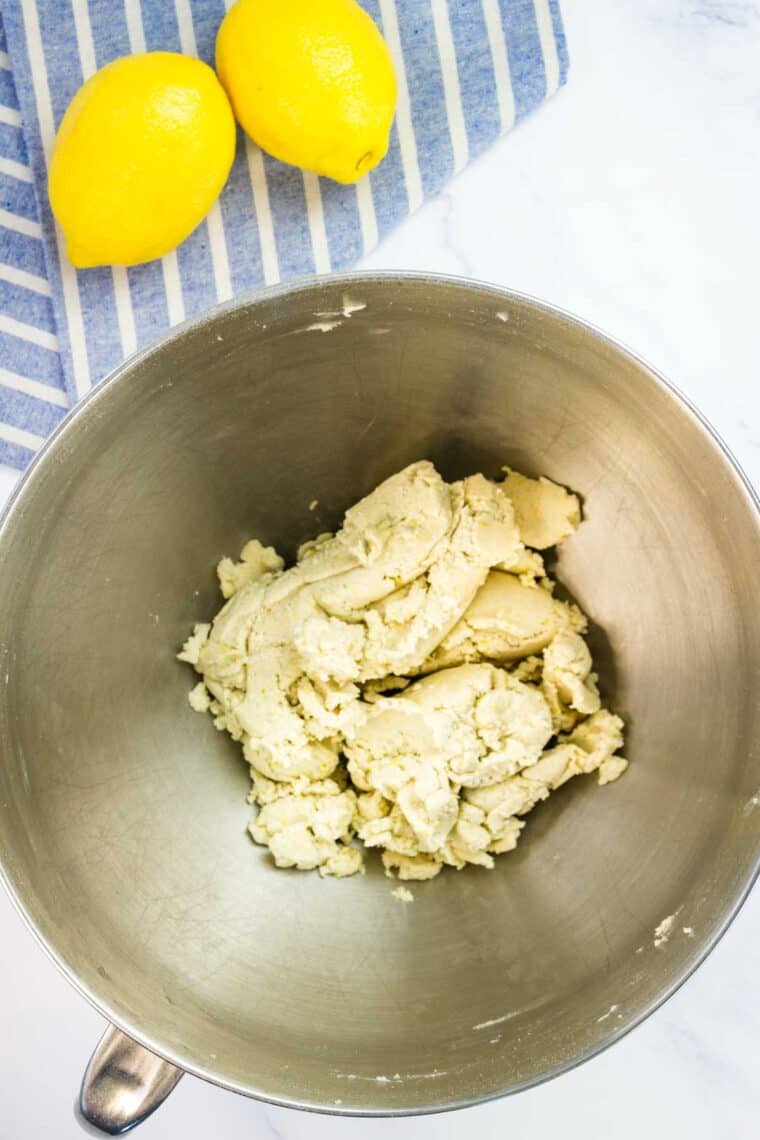 Lemon shortbread cookie dough in a bowl.