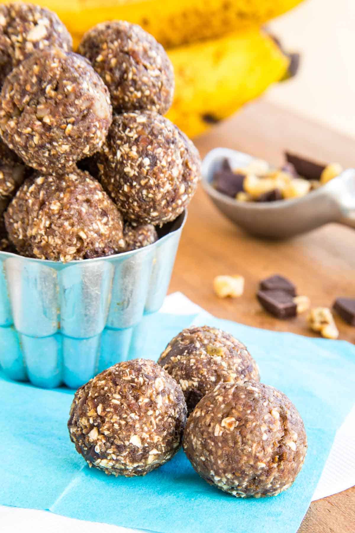 Chunky Monkey banana energy balls on a blue napkin.