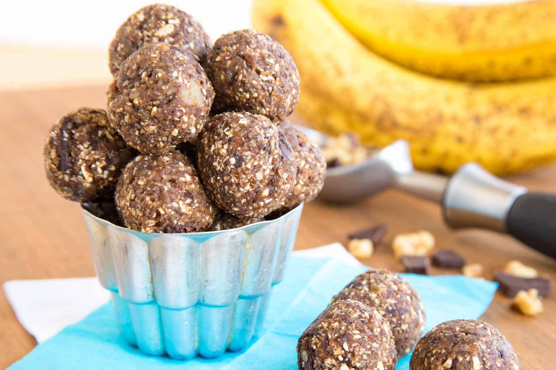 Chunky Monkey banana energy balls on a blue napkin.