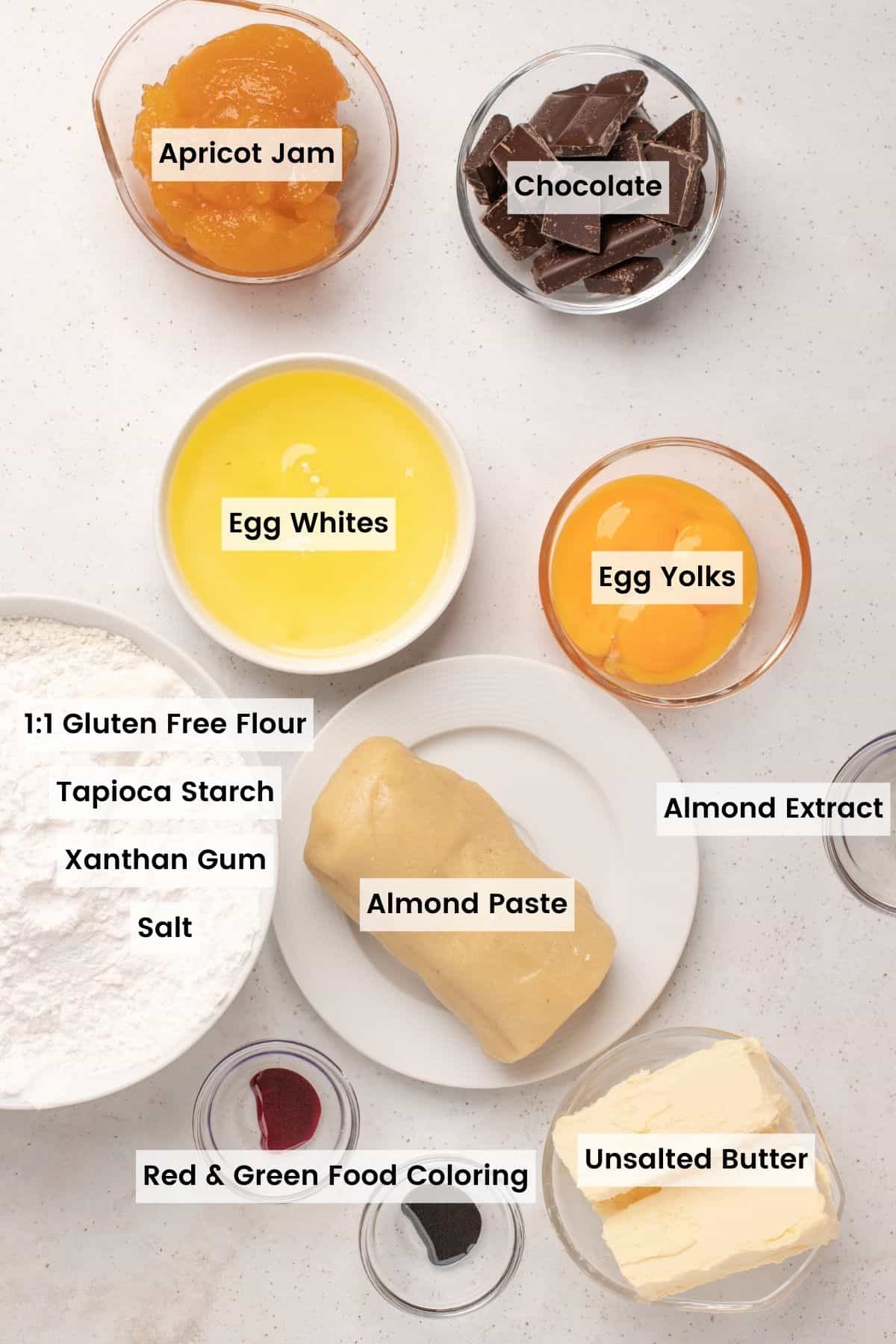 Ingredients for gluten free rainbow cookies portioned out in bowls with text labels.