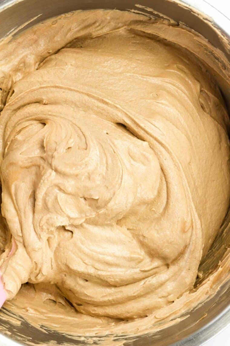 Nutella cheesecake filling is stirred until smooth.