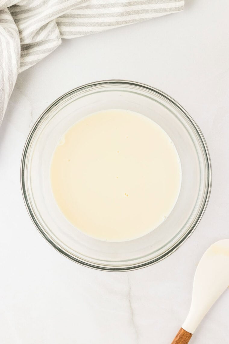 Add condensed milk to the gelatin mixture.