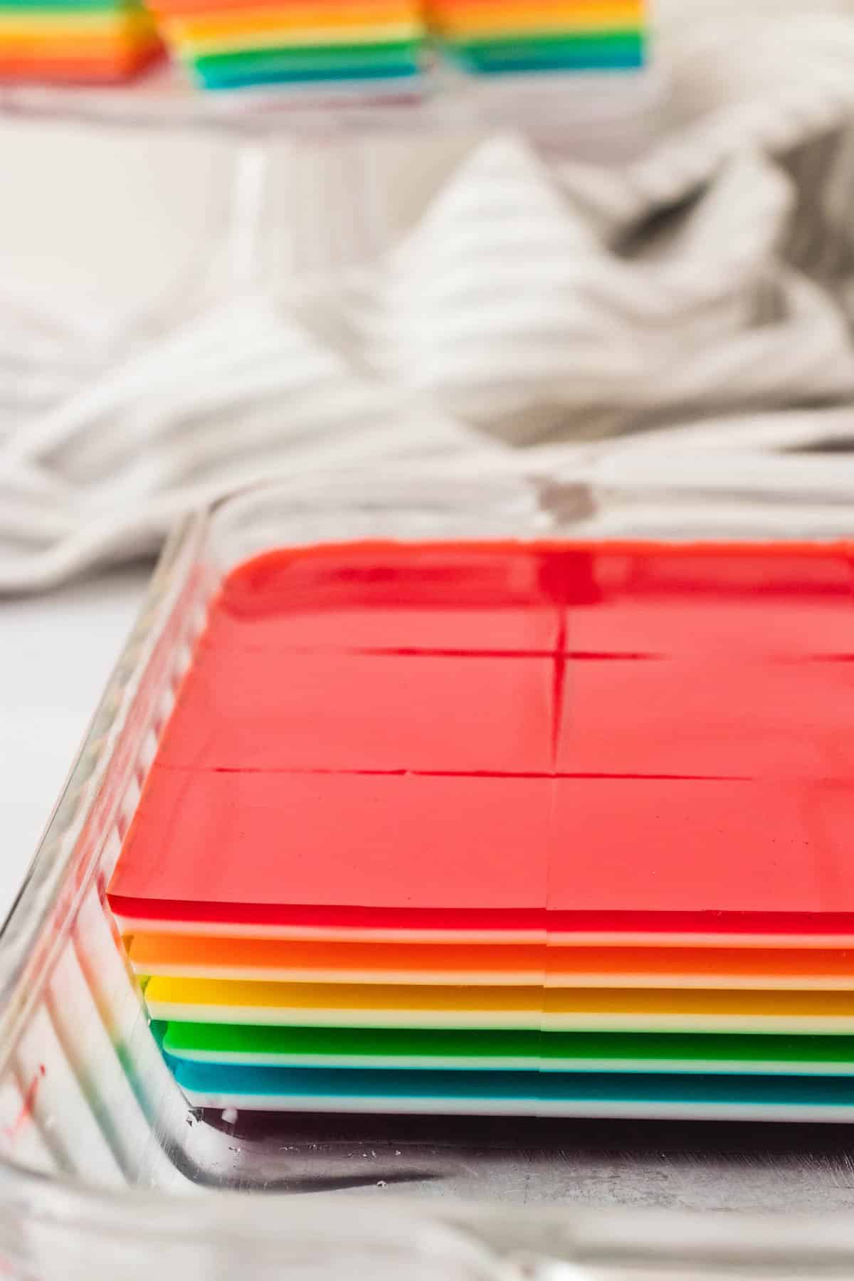 Layers of rainbow jello in a pan.