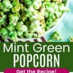 A birdseye view of green-colored popcorn with mini chocolate chips in a bowl and a side view of the overflowing blue bowl divided by a green box with text overlay that says "Mint Green Popcorn" and the words "Get the Recipe!".