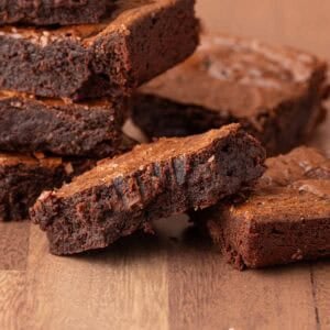 Mexican brownies on a wooden cutting board.