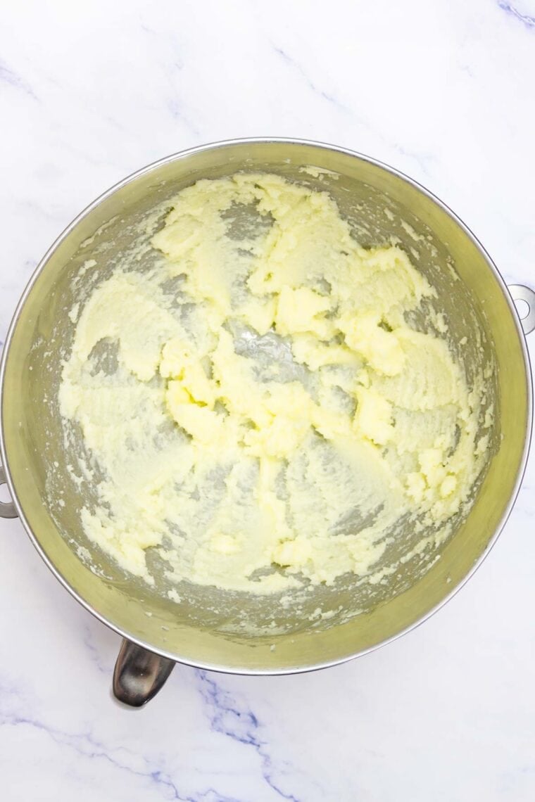 Butter and sugar creamed in a bowl.