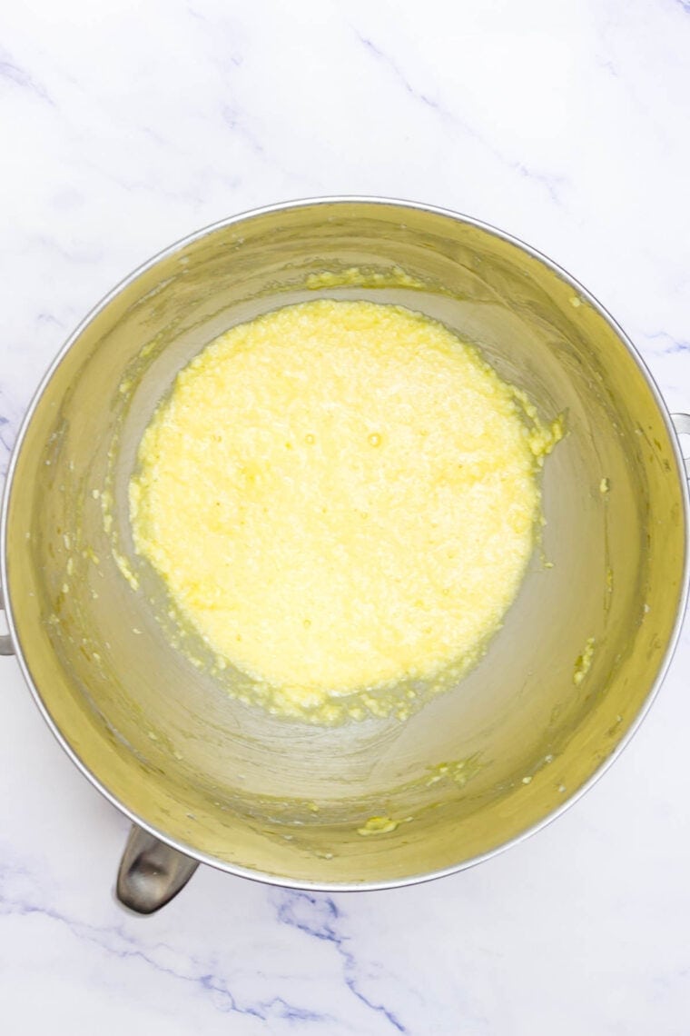 Eggs are added to creamed butter and sugar.
