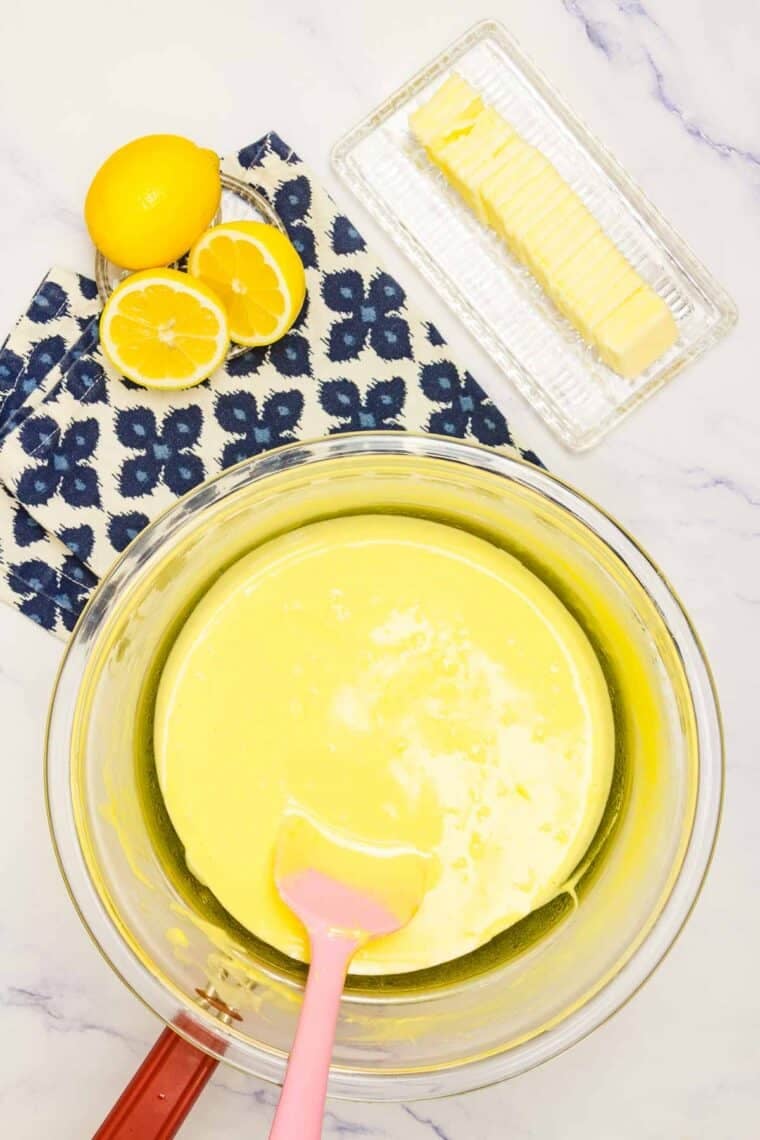 Heat lemon curd over simmering water.