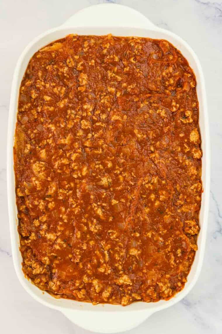 The layers are topped with more turkey sausage tomato sauce.