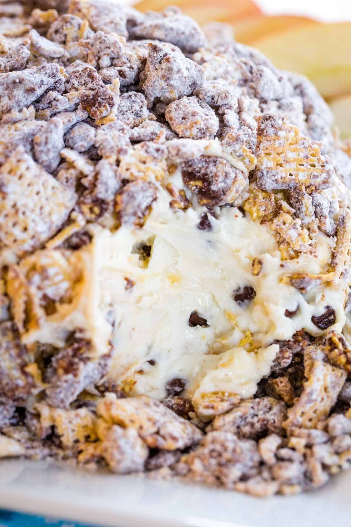 A closeup of the interior a peanut butter chocolate chip cheese ball.