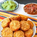 A plate of cauli tots with text overlay that says "Mexican Cauliflower Tots".