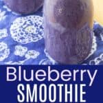 Two purple-colored smoothies in a glass bottles and looking down into the bottle with small wild blueberries floating on top and a yellow and white paper straw divided by a blue box with text overlay that says "Blueberry Smoothie" and the words cool, creamy, and sweet.