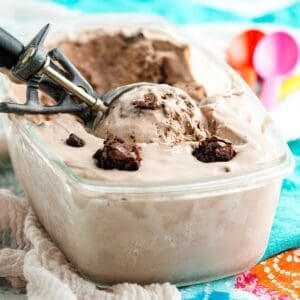 A glass loaf pan full of no-churn brownie batter ice cream.