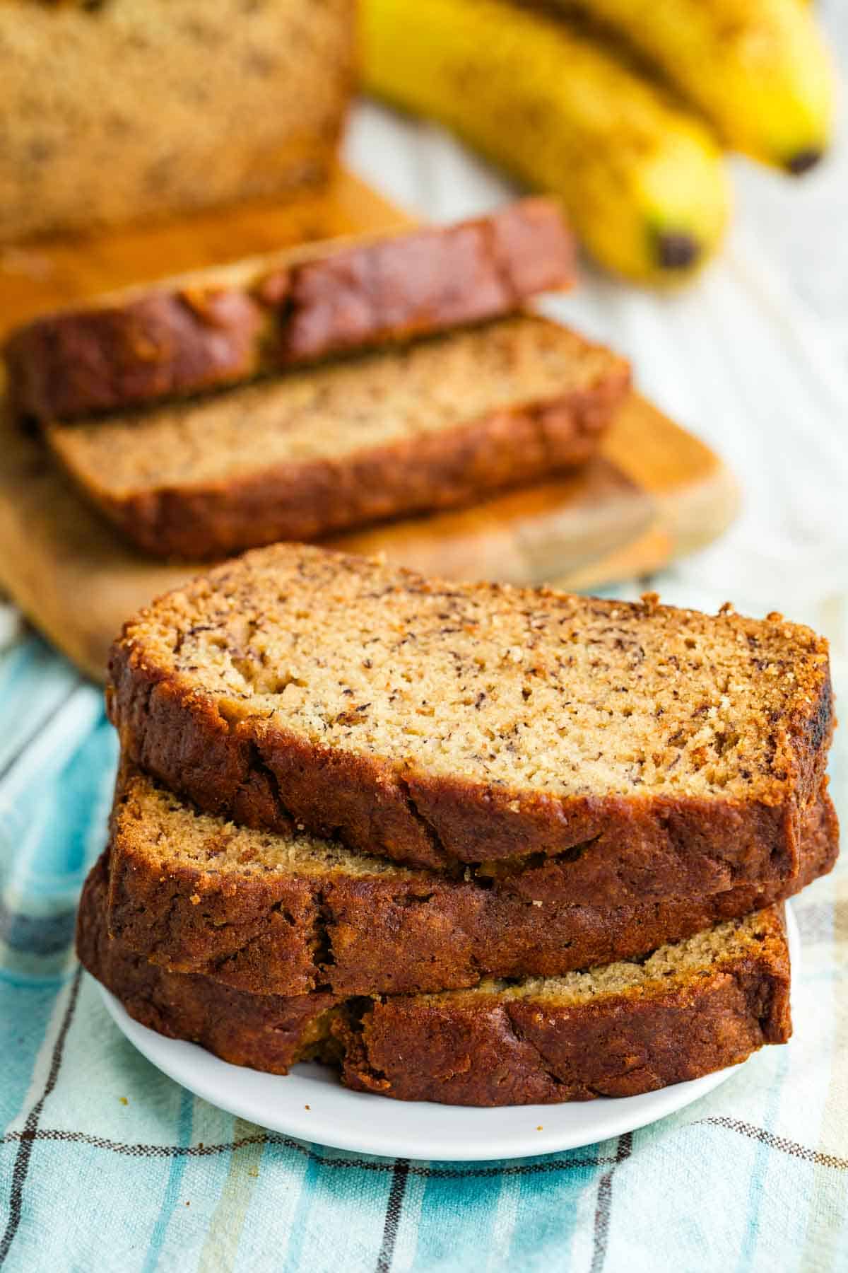 Slices of gluten-free banana bread on a plate.