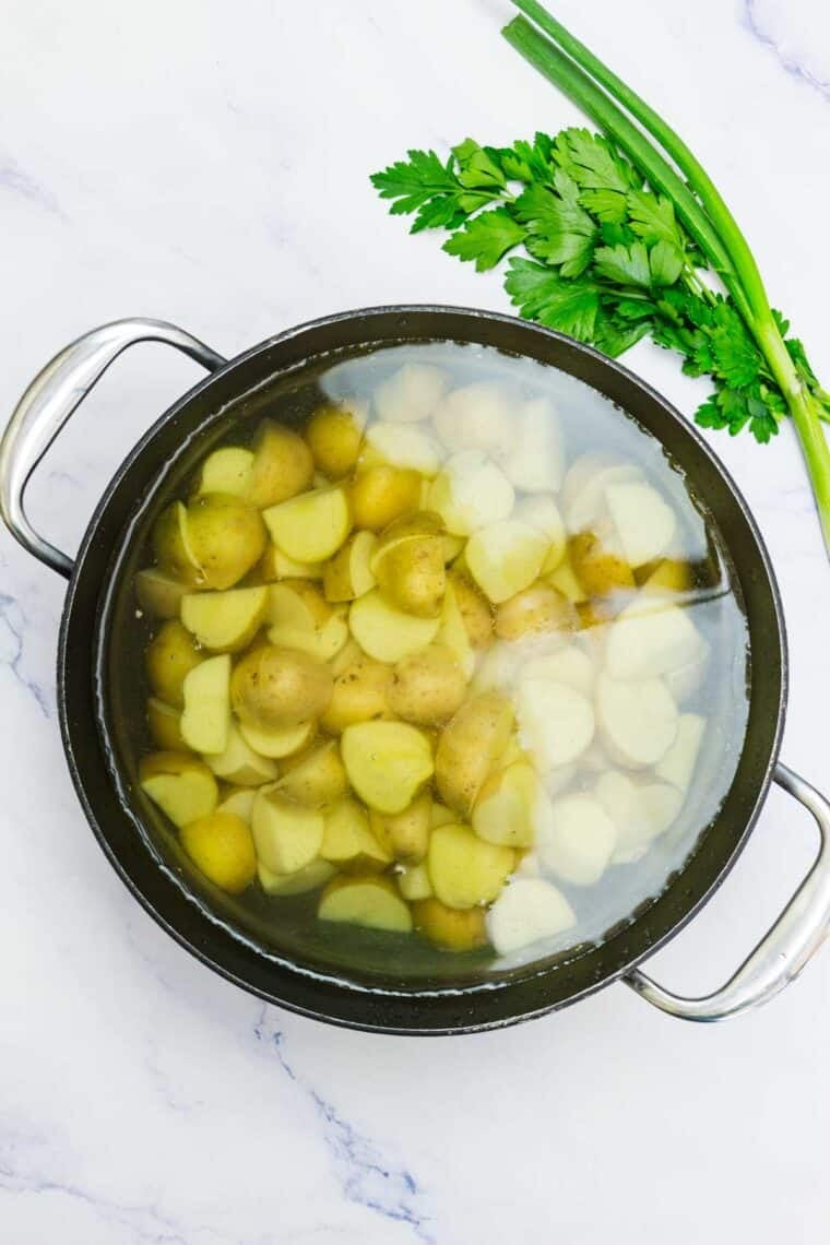Potatoes are cooked for ranch potato salad.
