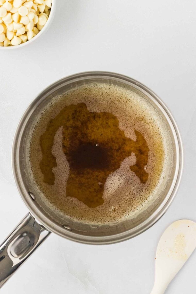 Butter and sugar combined in a bolw.