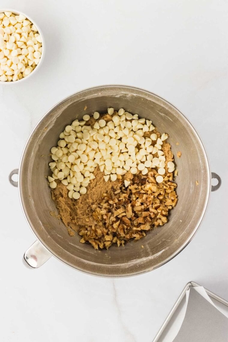 Walnuts and white chocolate chips added to blondie batter.