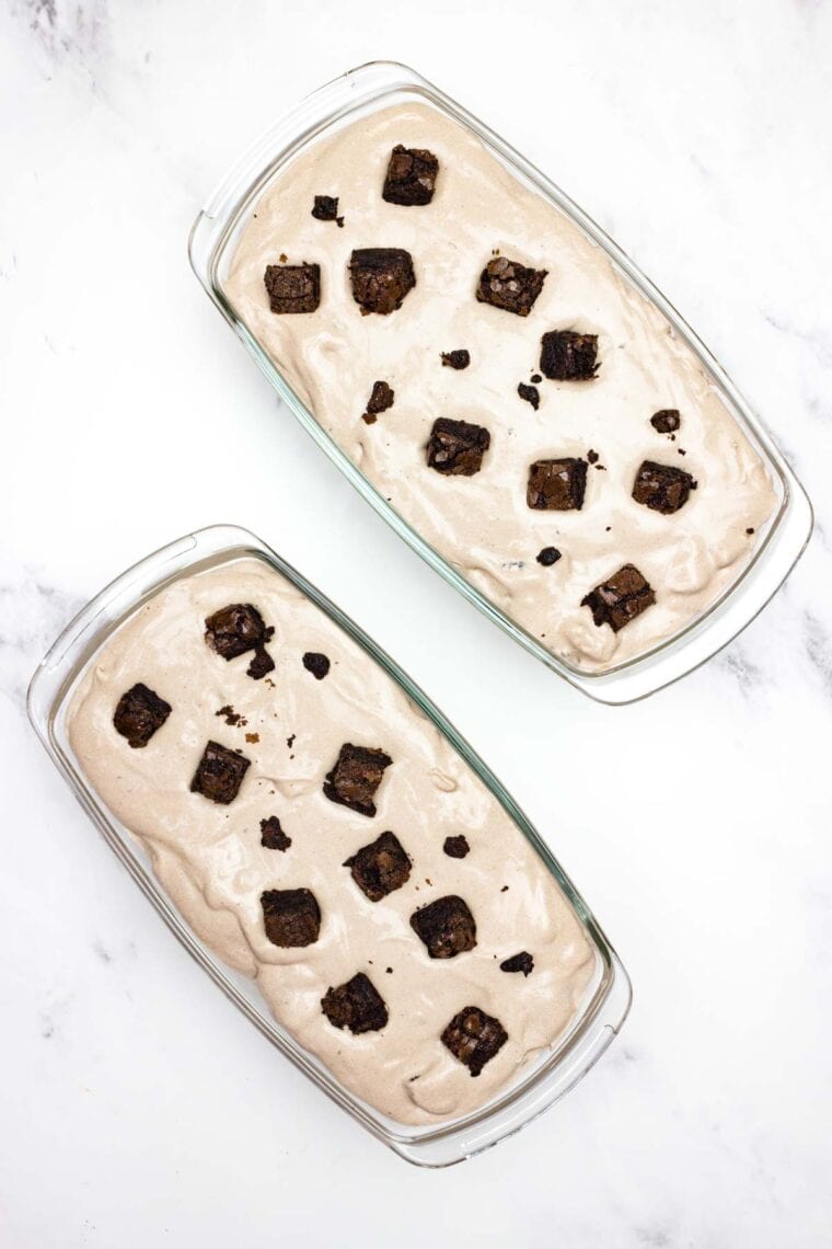 Brownie chunks are added to ice cream base.