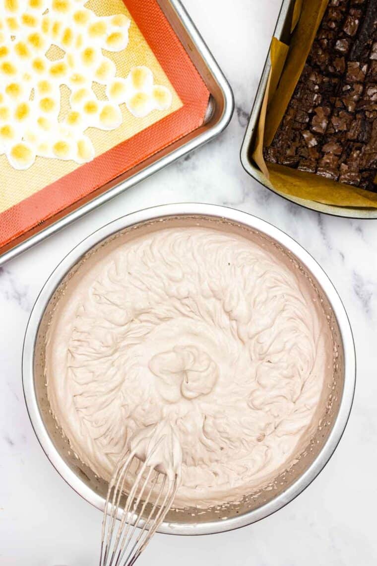 Heavy cream is whisked with brownie mix.