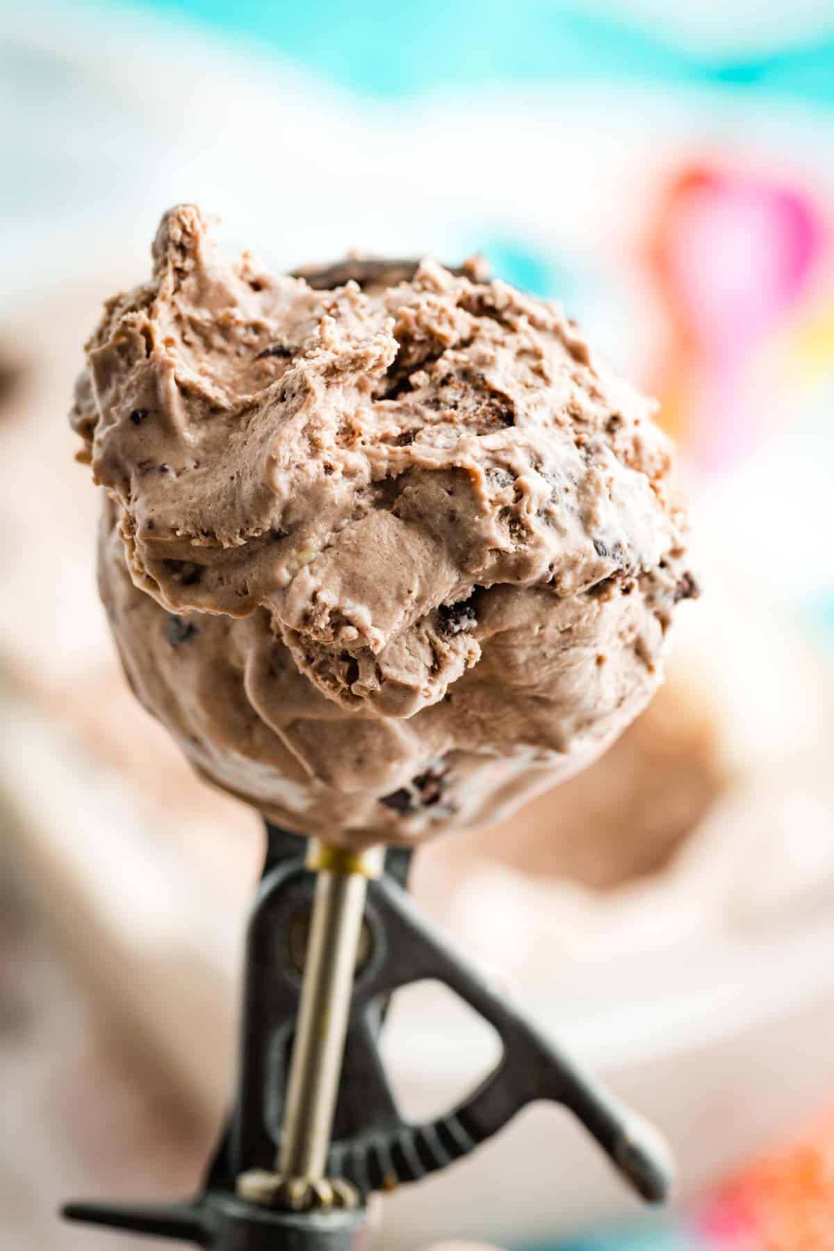 An ice cream scoop full of no-churn brownie batter ice cream.