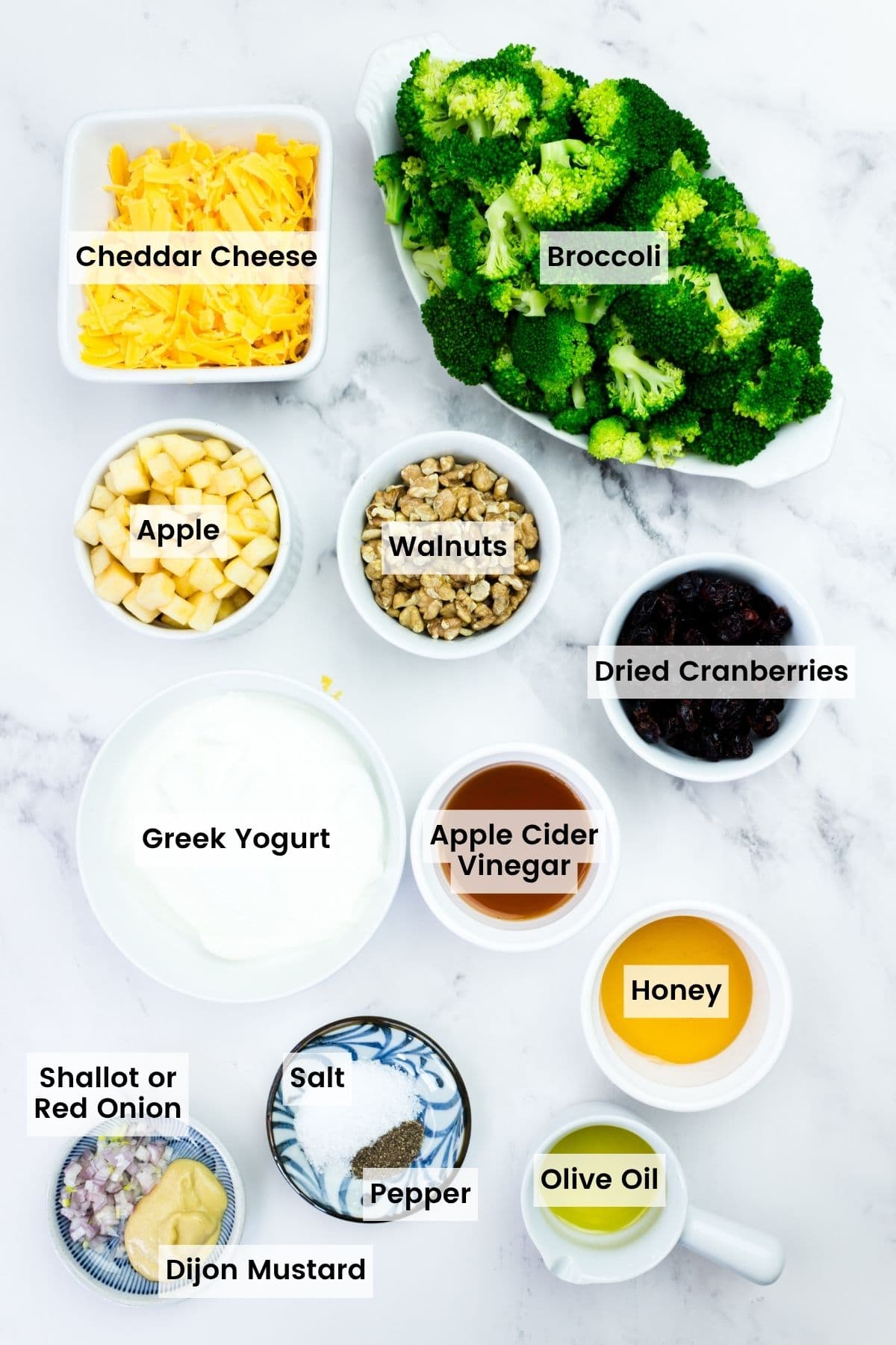 Labeled ingredients for broccoli apple salad.