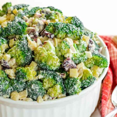 Broccoli apple salad in a serving bowl.