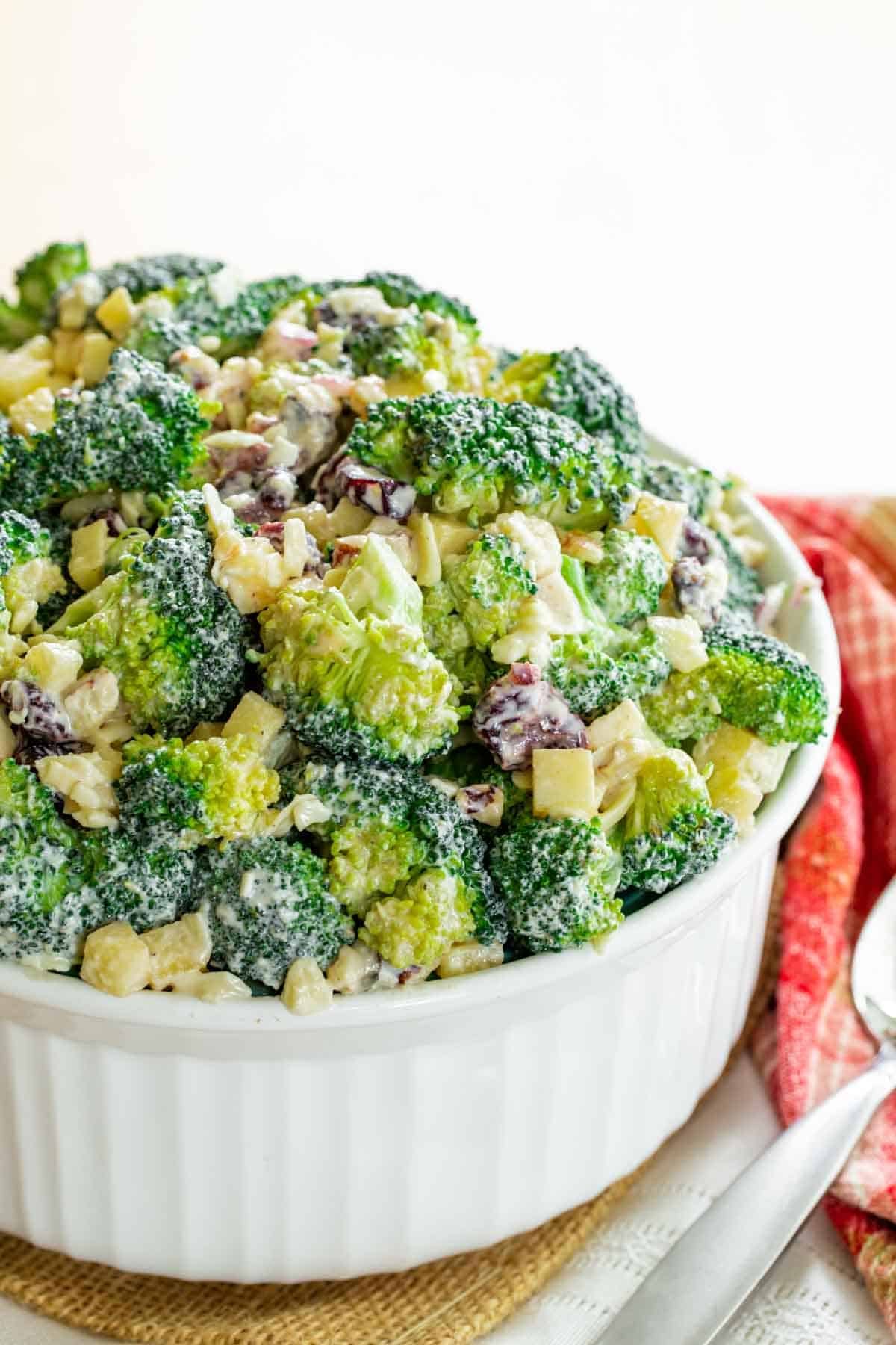 Broccoli apple salad in a serving bowl.