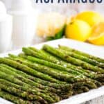 A platter of asparagus spears with text overlay that says "Grilled Asparagus".