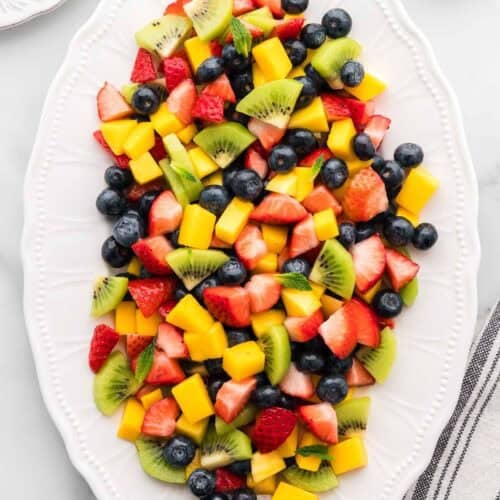Featured image for mango berry fruit salad recipe.