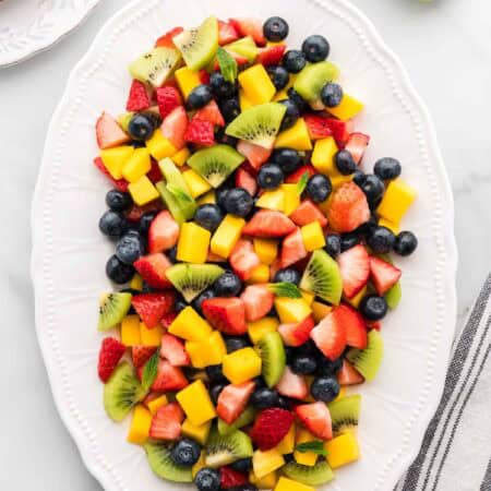 Overhead image of mango berry fruit salad.