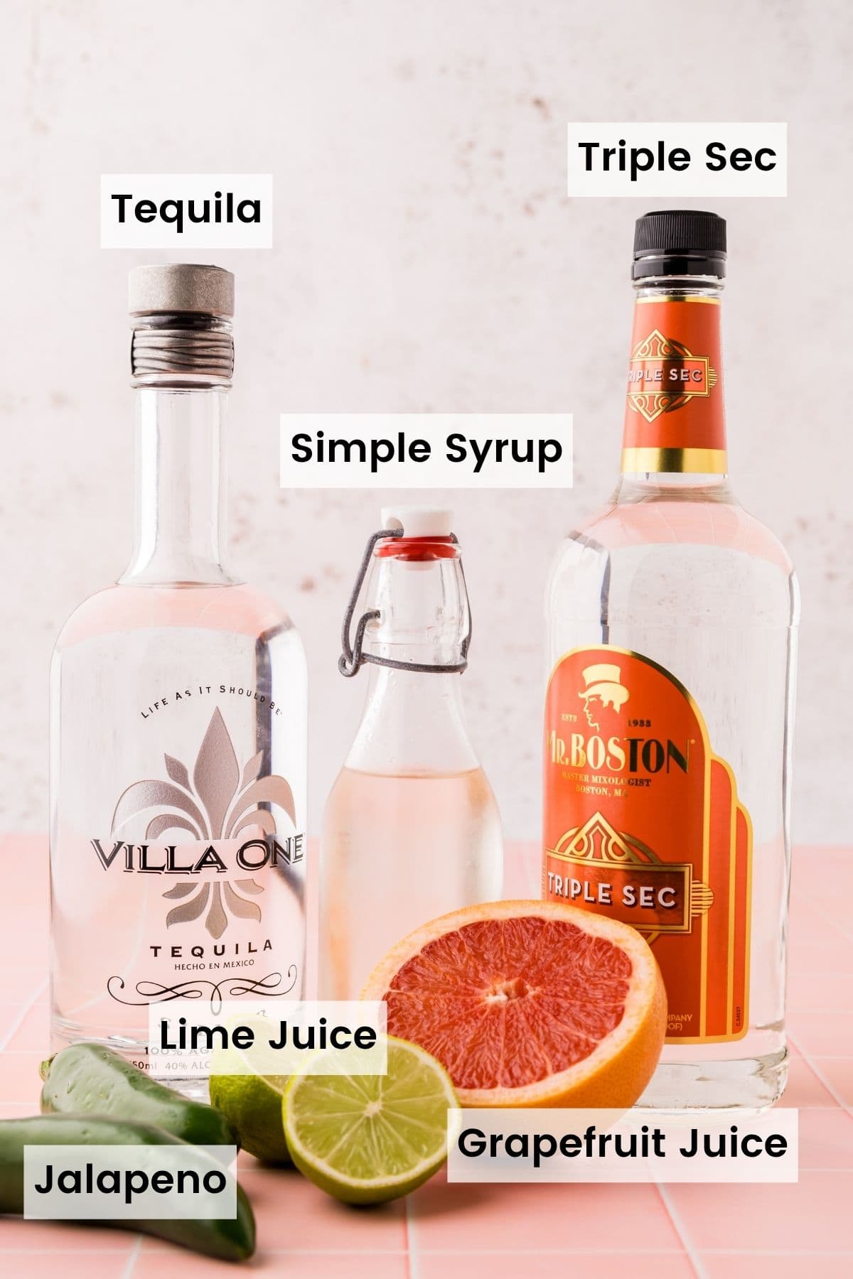 Labeled ingredients for spicy grapefruit margaritas.