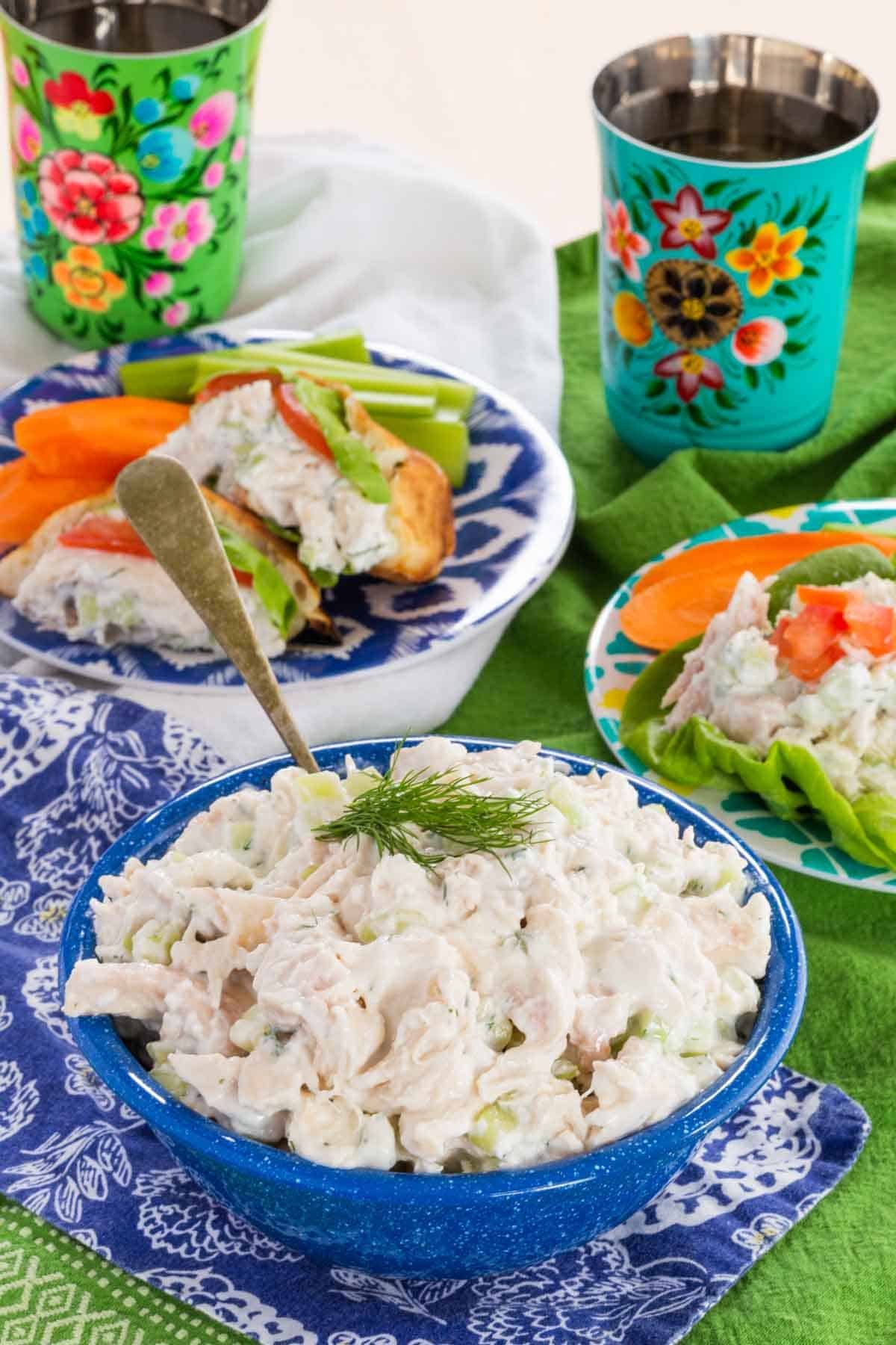 This Greek-ish tzatziki chicken salad combines juicy chicken, crunchy cucumber, and tangy Greek yogurt dressing with lemon, dill, and garlic. A bowl of tzatziki chicken salad.