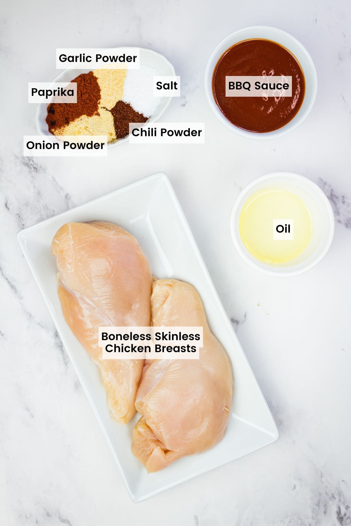 This BBQ chicken salad is loaded with BBQ chicken, crispy bacon, juicy pineapple, creamy avocado, and more. A sweet and savory masterpiece. Labeled ingredients for grilled BBQ chicken.