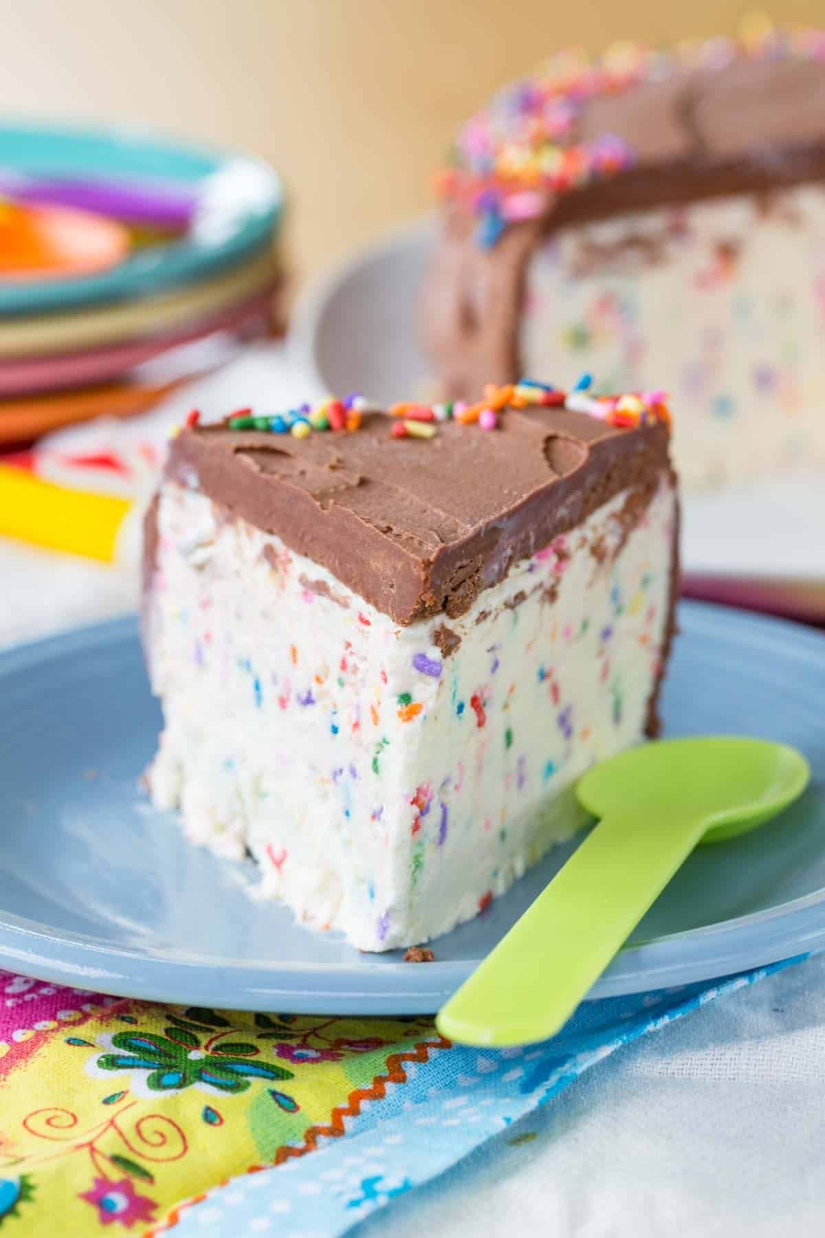 A slice of funfetti ice cream cake from the front.