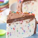 A slice of ice cream cake with rainbow sprinkles with text overlay that says "No-Churn Funfetti Ice Cream Cake".