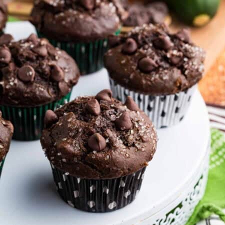 GF chocolate zucchini muffins in different colored wrappers.