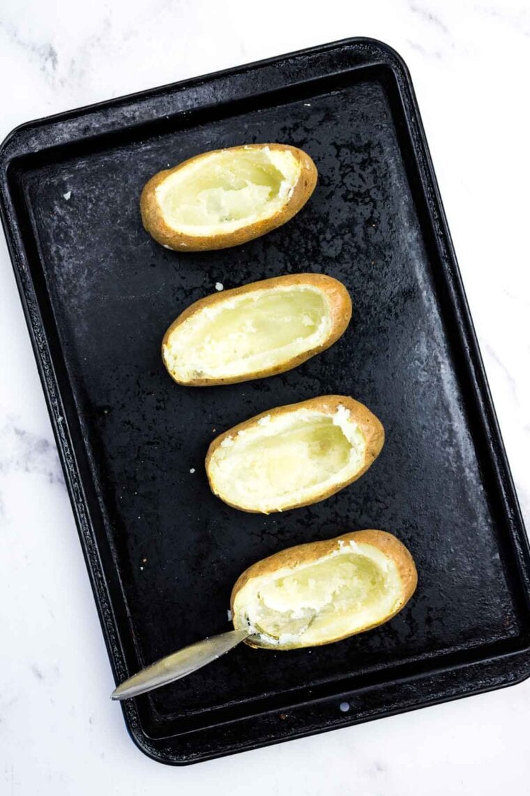 Four baked potato shells (just the skins, with fillings removed).
