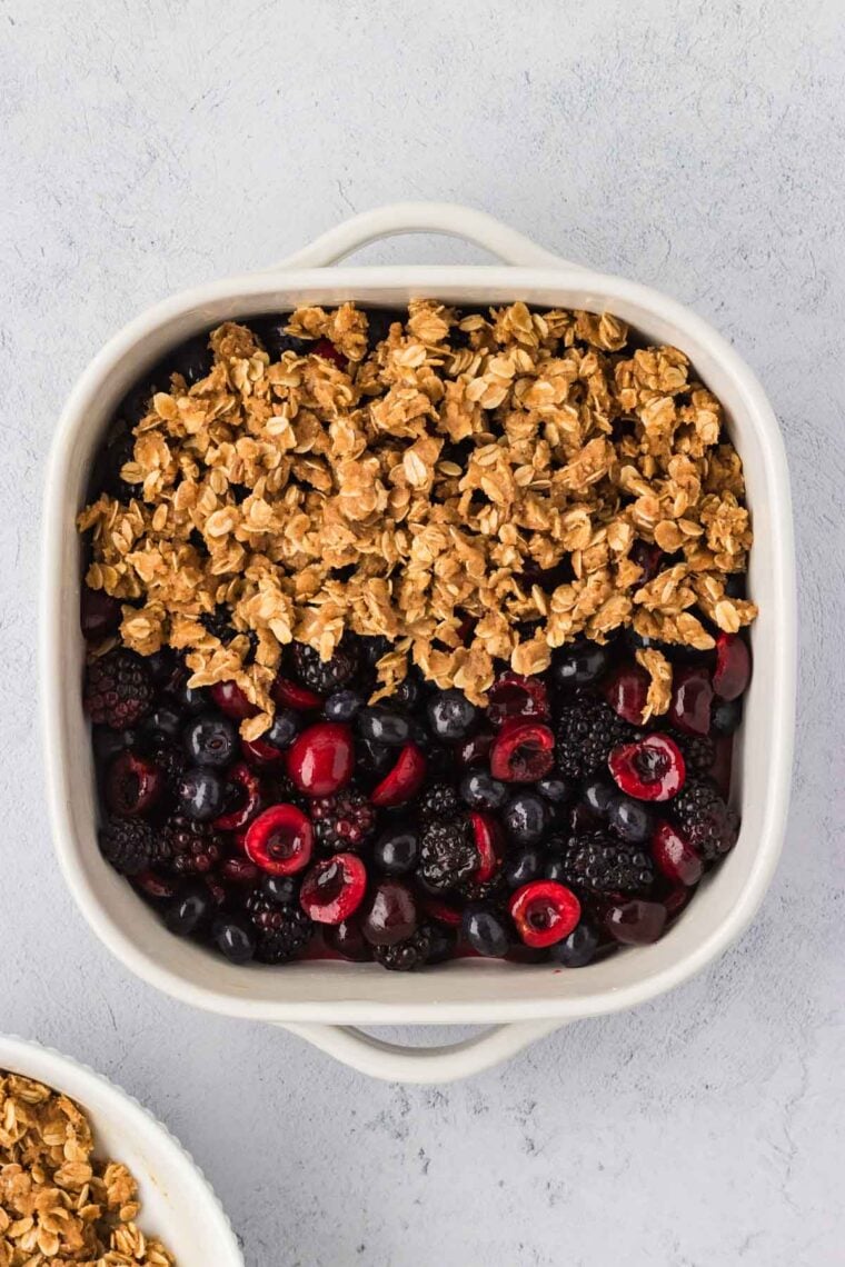 Topping berry filling with buttery oat topping.