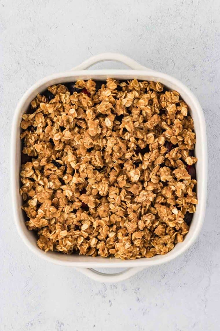 Berry crisp assembled and ready to bake.