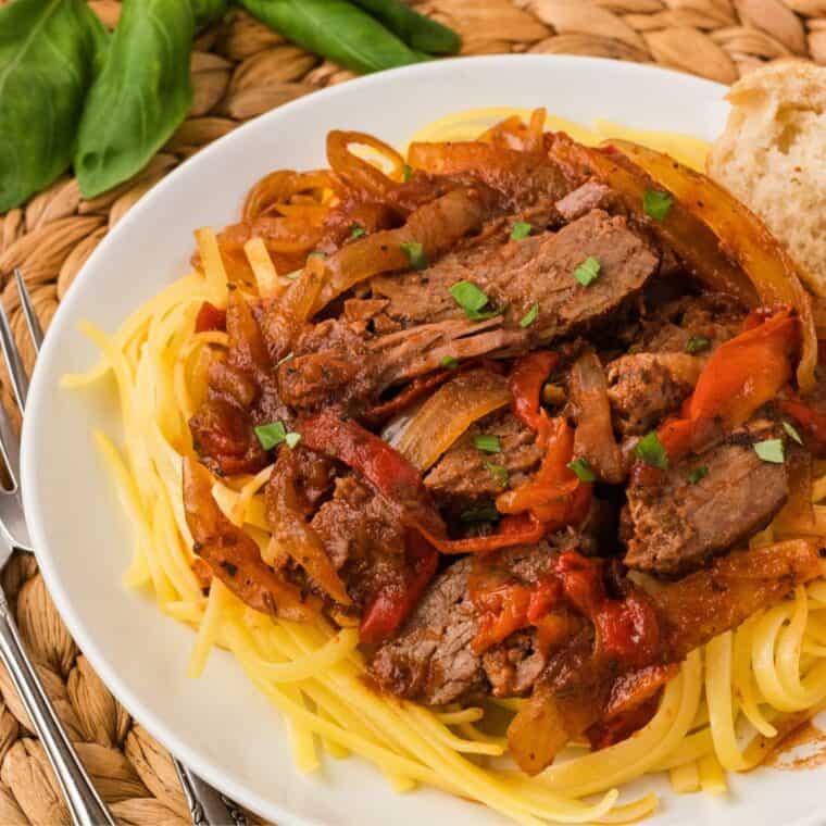 Featured image for slow cooker steak pizzaiola recipe.