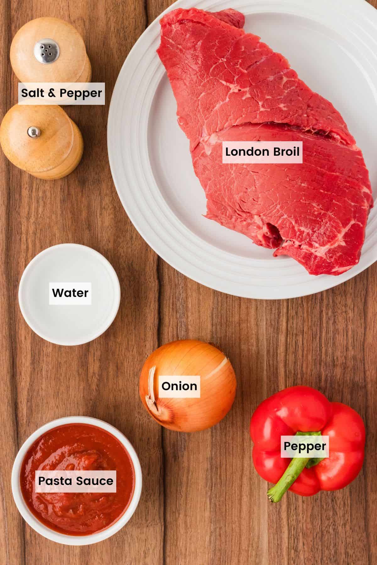 Labeled ingredients for slow cooker steak pizzaiola.