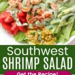 A bowl of lettuce topped with shrimp, corn, tomatoes, bacon, and hard boiled eggs and a serving of salad on a plate divided by a green box with text overlay that says "Southwest Shrimp Salad" and the words "Get the Recipe!".