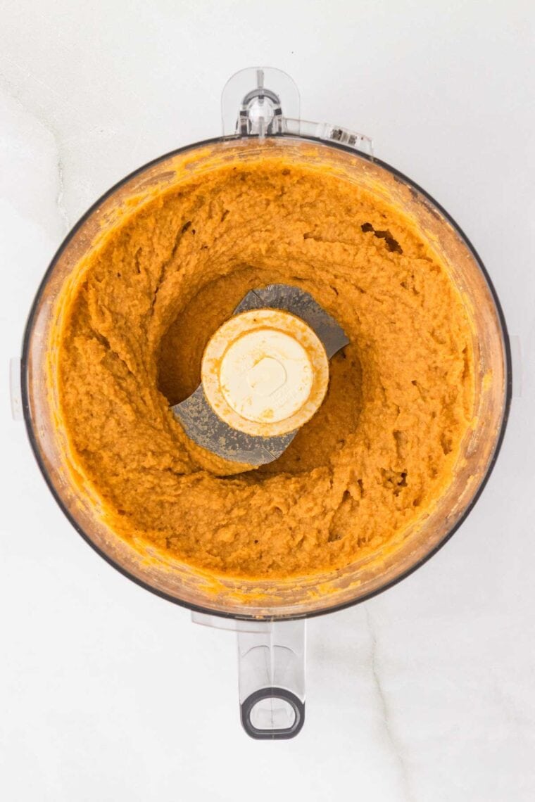 Sweet potato hummus in a food processor.