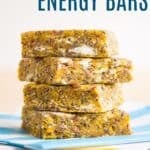 Four snack bars in a stack with text overlay that says "Mango Energy Bars".