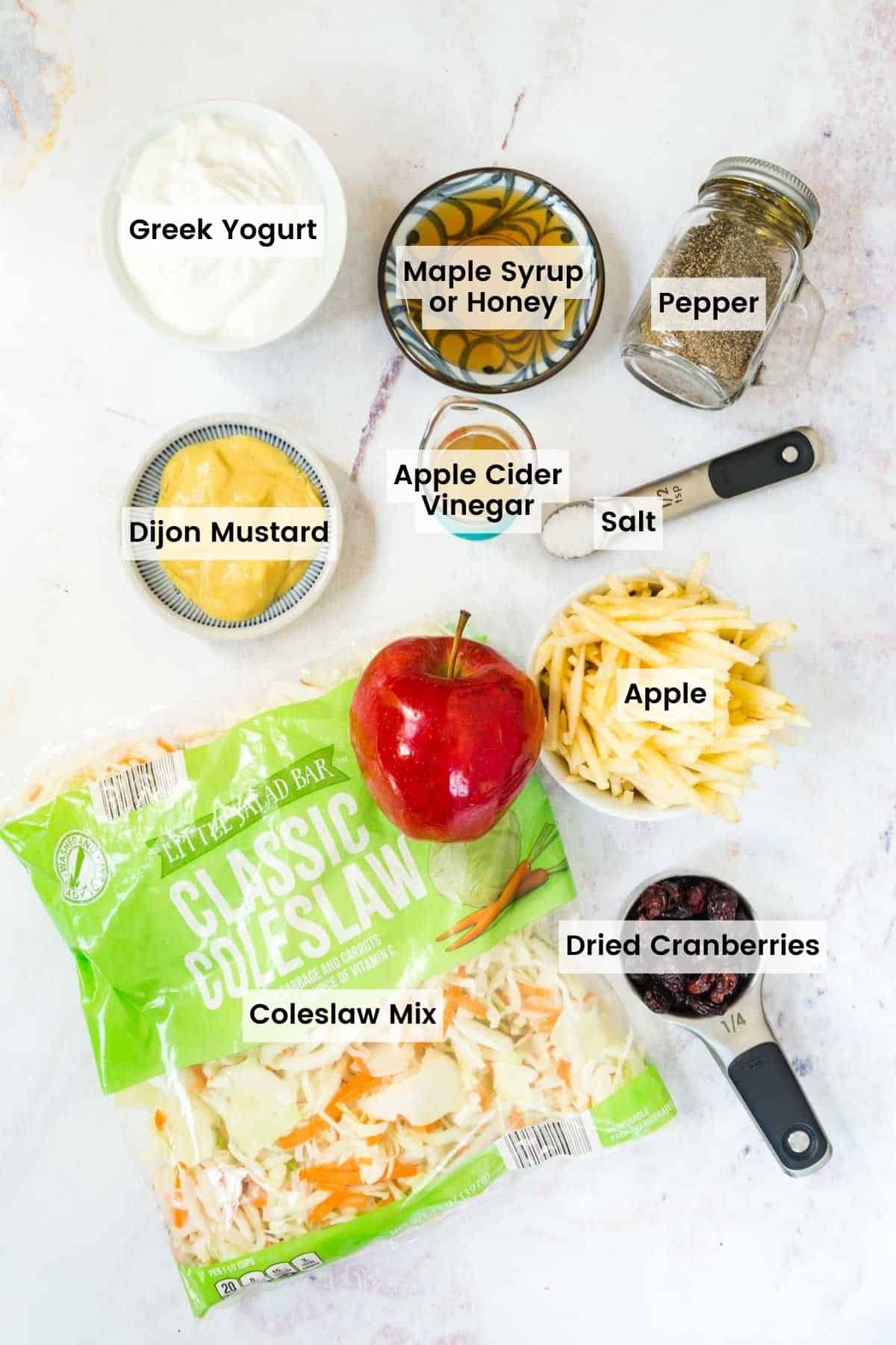 Recipes ingredients on a countertop with text labels.
